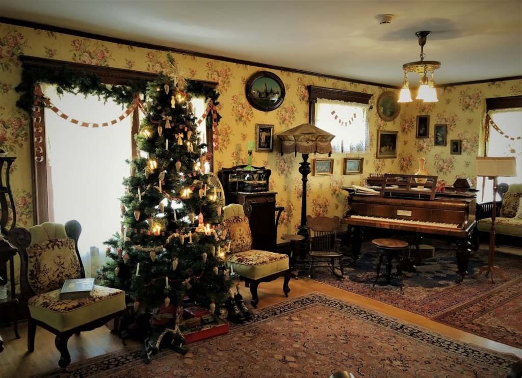 The cozy Thorpe House at Heritage Park all decorated for Christmas.