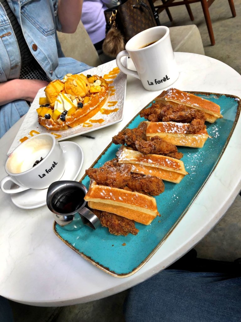 Mango waffle with mango ice cream and chicken and waffles and coffee