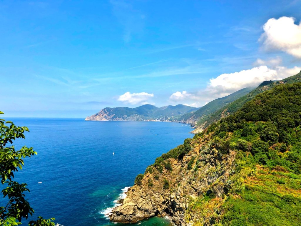 View of Cinque Terre National Park from Corniglia. The village of Vernazza is in the distance.
