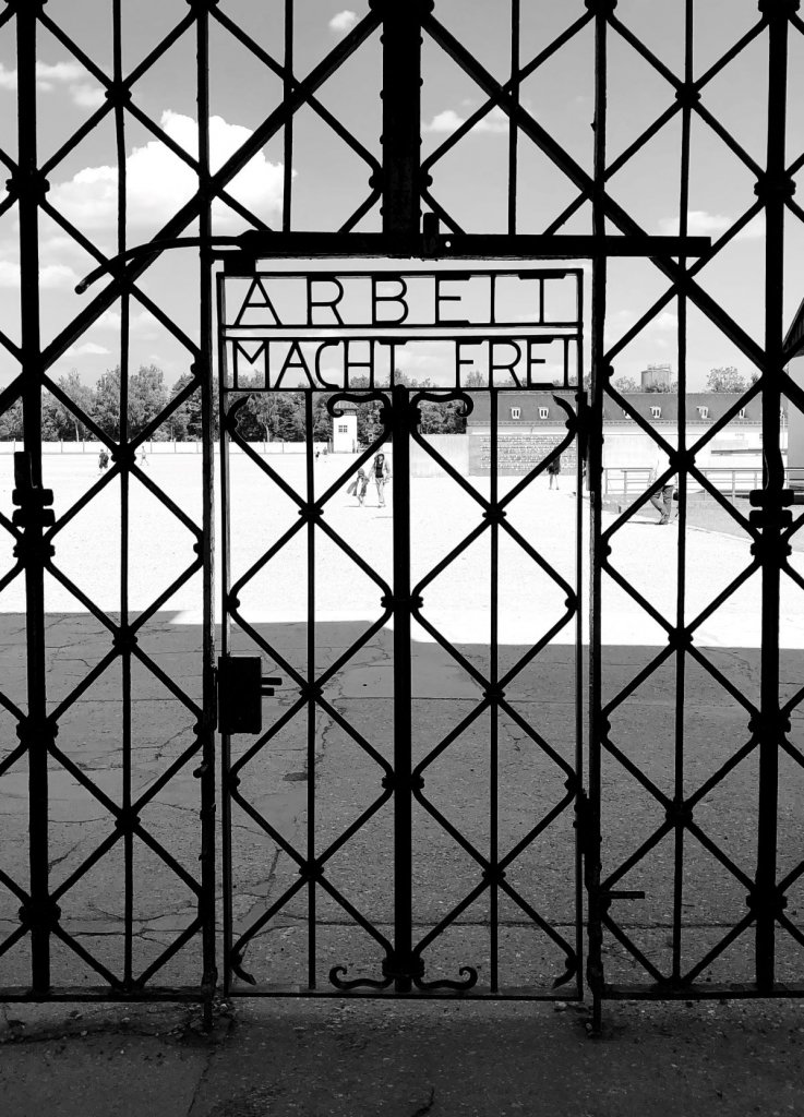 Arbeit Mach Frei the black iron gates leading into Dachau Concentration Camp