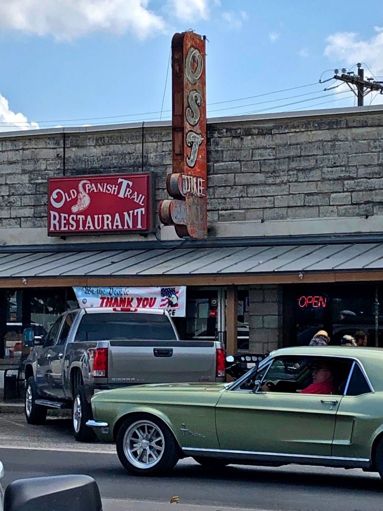 Vintage Mustang car in front of a restaurant in Bandera