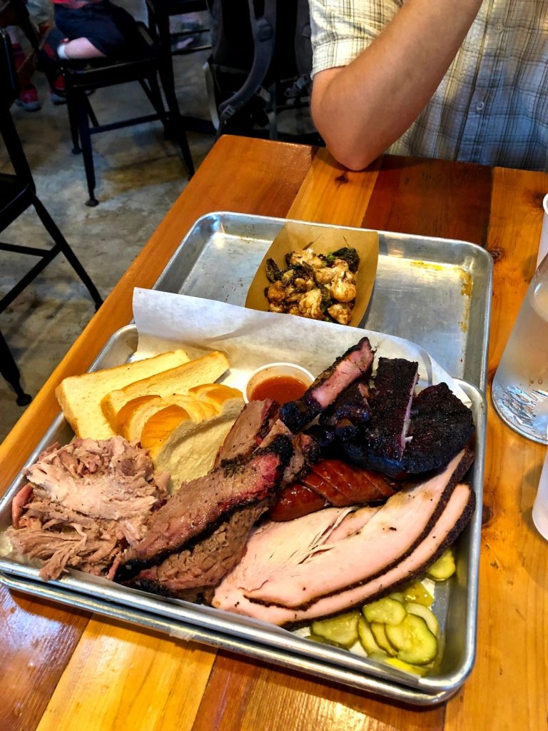 assortment of barbeque meats on a platter