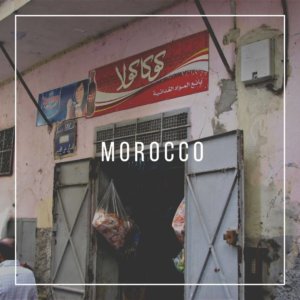 Streets of Morocco with open doors and coca cola signs