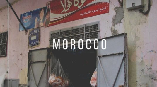 Streets of Morocco with open doors and coca cola signs