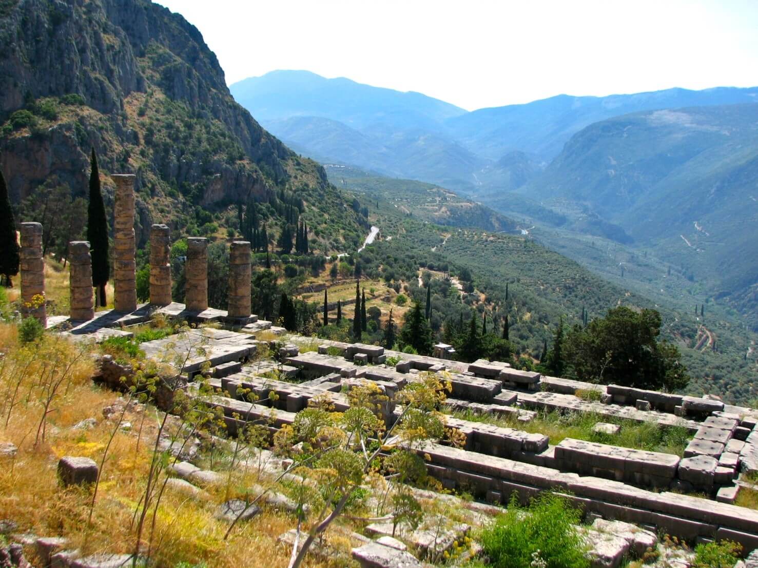 the ruins of Delphi, Greece as they sit on a hilltop