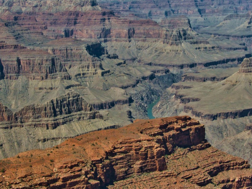 the grand canyon with the colorado river in the distance