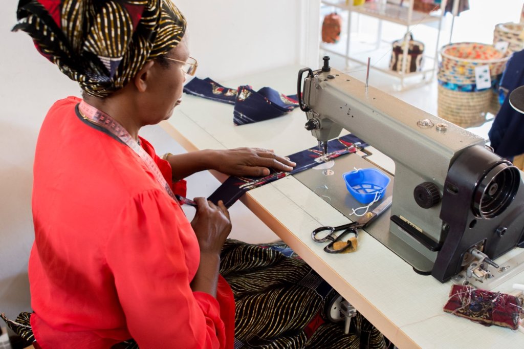 women using a sewing machine